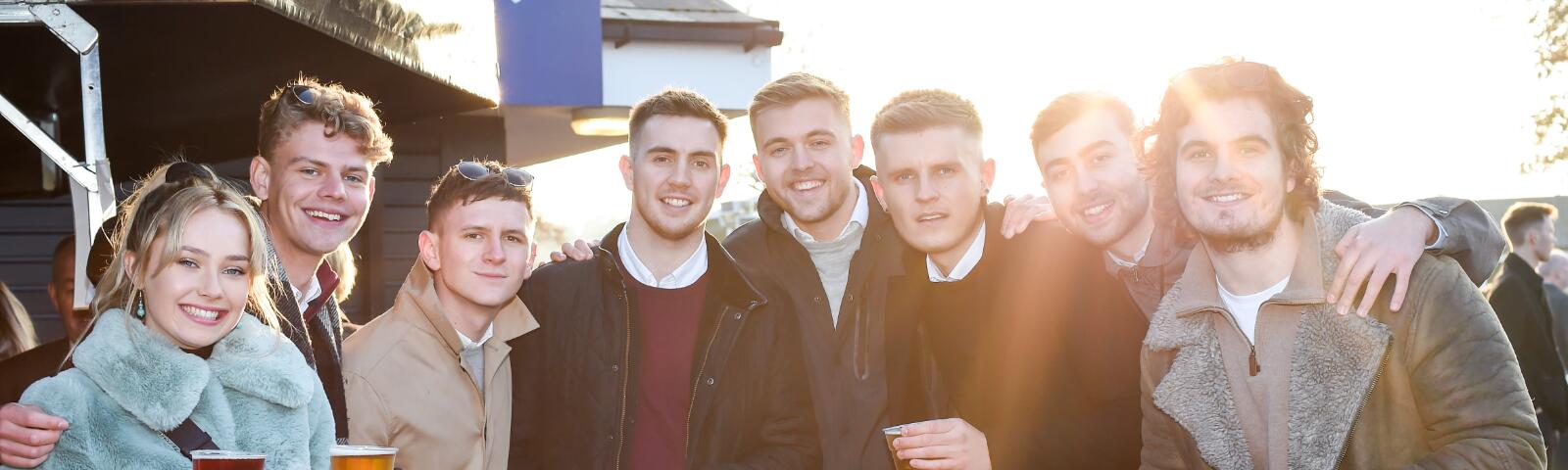 A large group of friends enjoy the races at Chepstow