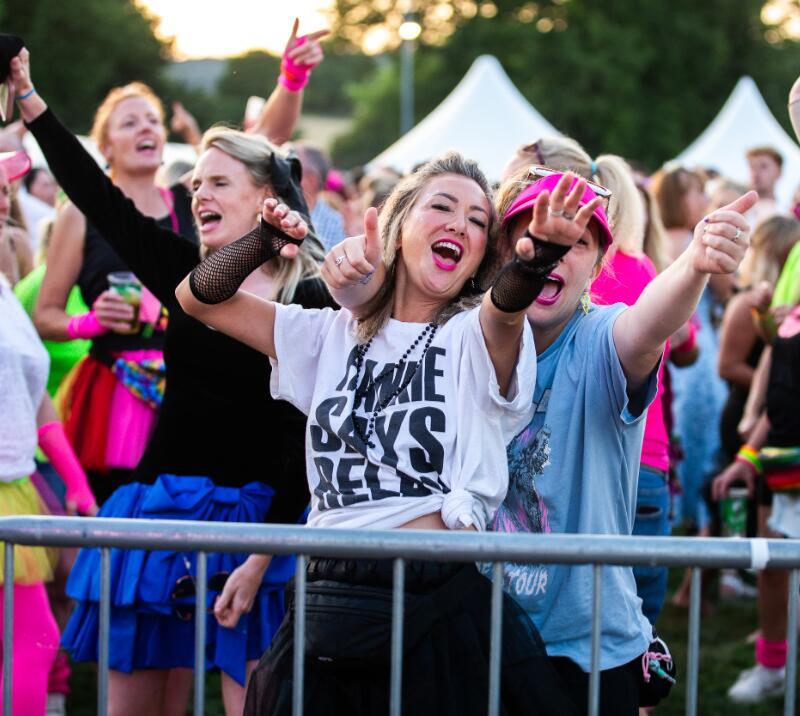 Race goers dressed for an 80s theme dance to the music at Chepstow